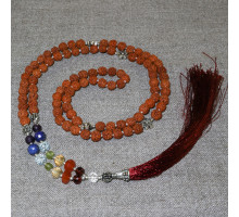 Rosary from rudraksha, decorated with semiprecious stones and silver