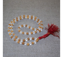 Rosary from white rudraksha and faceted crystal